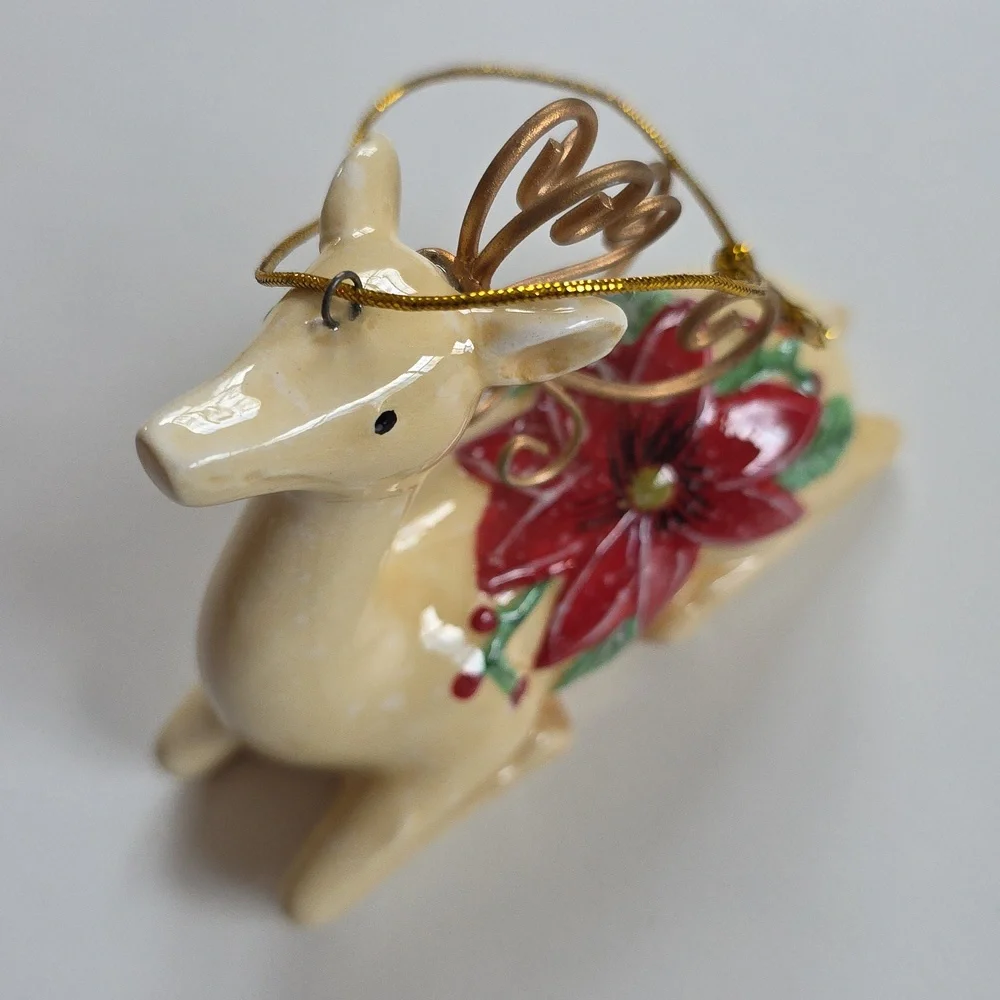 Holiday Reindeer Ornament with Red Flower Accents